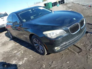 2011 BMW 7 Series 740i with VIN WBAKA4C58BC392020, listed as a IAAI auction lot 41314751 with 116,553 mi miles. Bid and sale history available at carsss.com. Image 1.