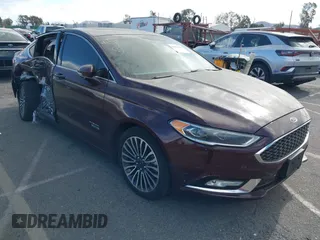2018 Ford Fusion Energi Titanium with VIN 3FA6P0SU1JR187598, listed as a IAAI auction lot 41211346 with 119,690 mi miles. Bid and sale history available at carsss.com. Image 1.