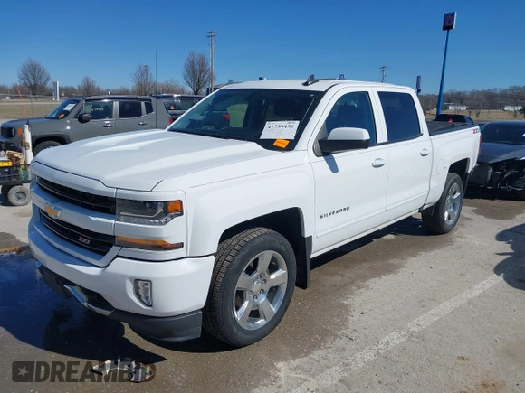 2018 Chevrolet Silverado 1500 LT with VIN 3GCUKREC3JG634354, listed as a IAAI auction lot 41734436 with 135,846 mi miles. Bid and sale history available at carsss.com. Image 19.