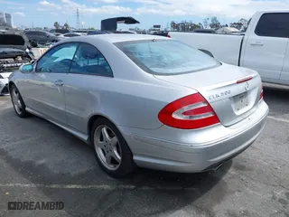2004 Mercedes-Benz CLK-Class 5.0L with VIN WDBTJ75J34F071716, listed as a IAAI auction lot 41818093 with 100,142 mi miles. Bid and sale history available at carsss.com. Image 3.