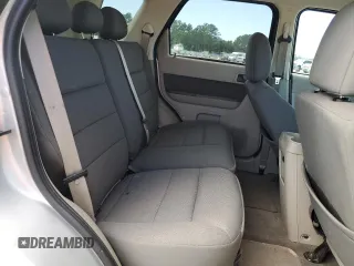 2009 Ford Escape Hybrid z VIN 1FMCU49399KD02275, wystawiony jako Copart lot #55536955 z przebiegiem 50 333 mil mil oraz Szkoda całkowita • Salvage title. Historia ofert i sprzedaży dostępna na DreamBid. Obrazek 11.