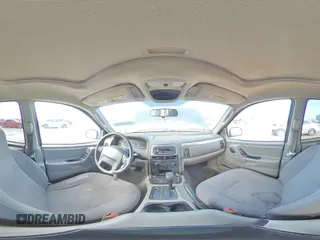 2003 Jeep Grand Cherokee Laredo with VIN 1J4GX48SX3C618284, listed as a Copart auction lot 43084045 with 132,528 mi miles and Salvage Title. Bid and sale history available at carsss.com. Image 13.