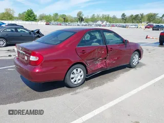 2004 Toyota Camry LE z VIN 4T1BE32K94U310300, wystawiony jako IAAI lot #42208680 z przebiegiem 104 701 mil mil oraz . Historia ofert i sprzedaży dostępna na DreamBid. Obrazek 4.