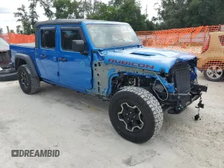 2022 Jeep Gladiator Rubicon with VIN 1C6JJTBG4NL111323, listed as a Copart auction lot 58772405 with 25,997 mi miles and Salvage title. Bid and sale history available at DreamBid. Image 4.