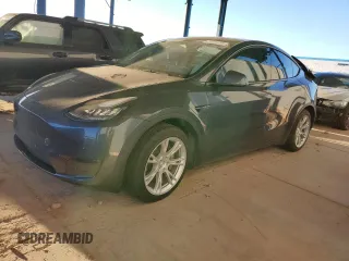 2021 Tesla Model Y Long Range with VIN 5YJYGDEEXMF151557, listed as a Copart auction lot 54936885 with 106,411 mi miles and Salvage Title. Bid and sale history available at DreamBid. Image 1.