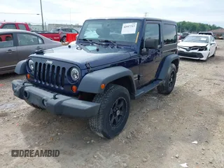 2013 Jeep Wrangler Sport with VIN 1C4AJWAG2DL505655, listed as a IAAI auction lot 42557213 with 185,502 mi miles and . Bid and sale history available at DreamBid. Image 2.
