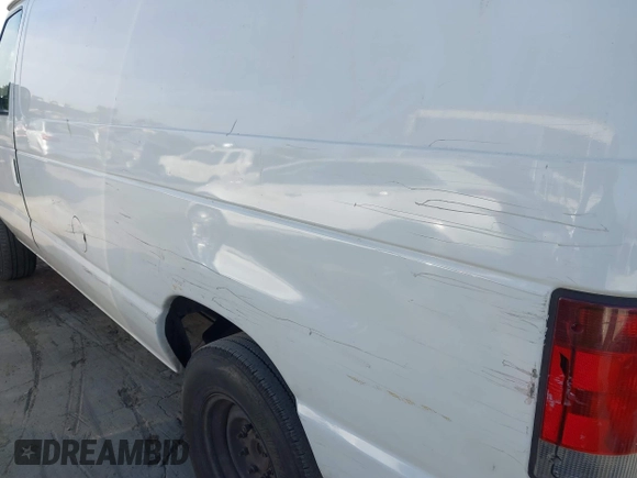 2014 Ford Econoline Cargo Commercial with VIN 1FTNE1EW4EDA92742, listed as a IAAI auction lot 41702320 with 207,179 mi miles and . Bid and sale history available at DreamBid. Image 18.