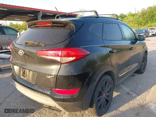 2017 Hyundai Tucson Value with VIN KM8J33A2XHU462806, listed as a IAAI auction lot 42045963 with 102,678 mi miles. Bid and sale history available at carsss.com. Image 4.