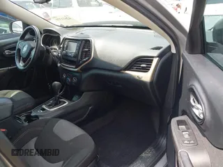 2016 Jeep Cherokee Altitude with VIN 1C4PJLAB7GW307900, listed as a IAAI auction lot 42611390 with 130,123 mi miles and . Bid and sale history available at DreamBid. Image 5.