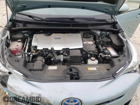 2017 Toyota Prius Two z VIN JTDKARFU9H3031195, wystawiony jako Copart lot #56852615 z przebiegiem 56 481 mil mil oraz Szkoda całkowita • Salvage title. Historia ofert i sprzedaży dostępna na DreamBid. Obrazek 11.