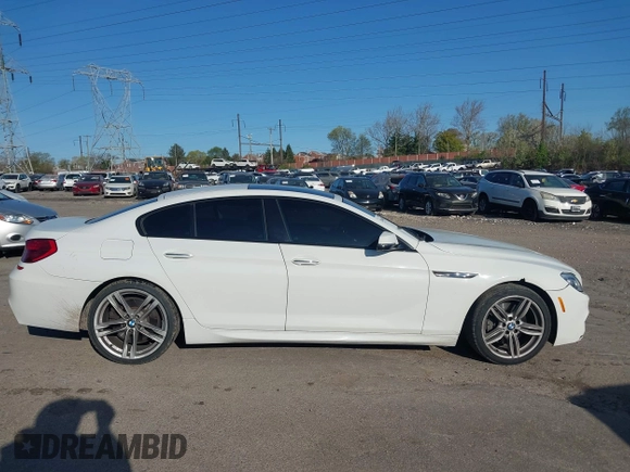 2016 BMW 6 Series 640i xDrive with VIN WBA6D2C51GGT66209, listed as a IAAI auction lot 42064405 with 113,500 mi miles and . Bid and sale history available at carsss.com. Image 14.