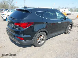 2018 Hyundai Santa Fe Sport 2.4L with VIN 5NMZUDLB6JH073309, listed as a IAAI auction lot 42016586 with 90,933 mi miles. Bid and sale history available at carsss.com. Image 4.