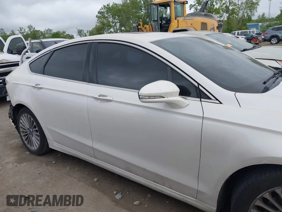 2016 Ford Fusion Titanium with VIN 3FA6P0K96GR103571, listed as a IAAI auction lot 42340764 with 180,870 mi miles and . Bid and sale history available at DreamBid. Image 13.