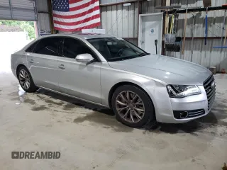 2012 Audi A8 z VIN WAURVAFD4CN038599, wystawiony jako Copart lot #59554025 z przebiegiem 93 334 mil mil oraz Szkoda całkowita • Salvage title. Historia ofert i sprzedaży dostępna na DreamBid. Obrazek 4.