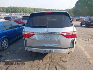 2013 Honda Odyssey EX-L with VIN 5FNRL5H6XDB084016, listed as a IAAI auction lot 42044300 with 156,296 mi miles and . Bid and sale history available at carsss.com. Image 16.
