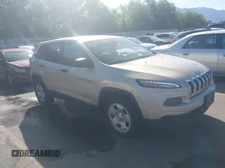 2015 Jeep Cherokee Sport z VIN 1C4PJMAB9FW520075, wystawiony jako IAAI lot #42369985 z przebiegiem 127 788 mil mil oraz . Historia ofert i sprzedaży dostępna na DreamBid. Obrazek 1.