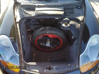 2000 Porsche Boxster z VIN WP0CA2983YU621686, wystawiony jako Copart lot #88951585 z przebiegiem 127 276 mil mil oraz Tytuł czysty. Historia ofert i sprzedaży dostępna na DreamBid. Obrazek 11.