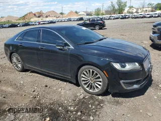 2017 Lincoln MKZ Select z VIN 3LN6L5D97HR601971, wystawiony jako Copart lot #57715655 z przebiegiem 130 071 mil mil oraz Czysty tytuł • Clean title. Historia ofert i sprzedaży dostępna na DreamBid. Obrazek 4.