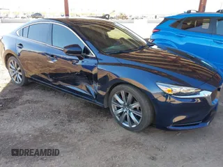 2020 Mazda 6 Touring with VIN JM1GL1VM2L1514941, listed as a IAAI auction lot 41831353 with 154,033 mi miles. Bid and sale history available at carsss.com. Image 1.