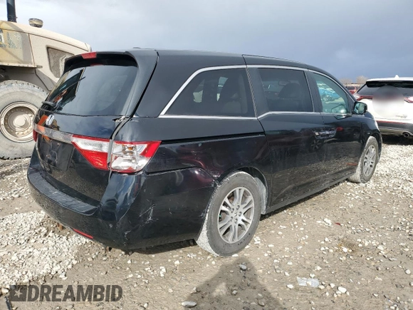 2011 Honda Odyssey EX-L with VIN 5FNRL5H67BB001266, listed as a Copart auction lot 48247265 with 160,524 mi miles and Salvage Title. Bid and sale history available at DreamBid. Image 3.