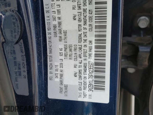2015 Mazda 3 i Touring with VIN 3MZBM1L78FM235597, listed as a Copart auction lot 51717005 with 57,186 mi miles and Salvage title. Bid and sale history available at DreamBid. Image 12.