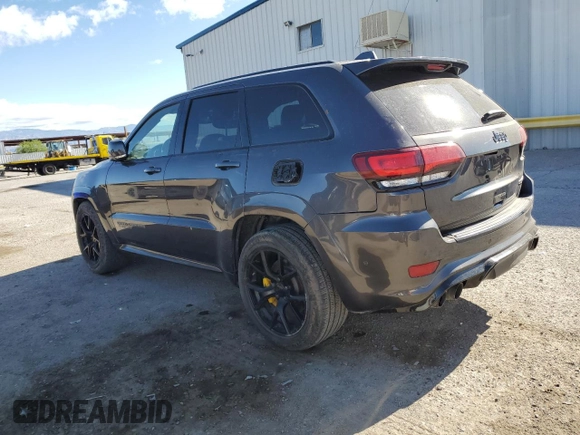 2018 Jeep Grand Cherokee Trackhawk with VIN 1C4RJFN96JC377074, listed as a Copart auction lot 53305975 with 27,625 mi miles and Salvage title. Bid and sale history available at DreamBid. Image 2.