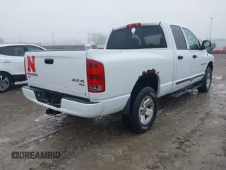 2003 Dodge 1500 SLT z VIN 1D7HU18N93J621948, wystawiony jako IAAI lot #41448520 z przebiegiem 200 091 mil mil oraz . Historia ofert i sprzedaży dostępna na DreamBid. Obrazek 4.