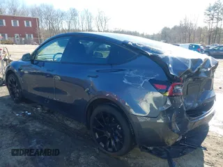 2023 Tesla Model Y Long Range with VIN 7SAYGAEE9PF905943, listed as a IAAI auction lot 41444255 with 11,179 mi miles and . Bid and sale history available at DreamBid. Image 3.
