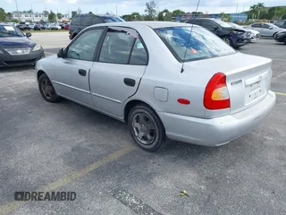 2002 Hyundai Accent GL with VIN KMHCG45C52U378454, listed as a IAAI auction lot 41418653 with 173,564 mi miles. Bid and sale history available at carsss.com. Image 3.