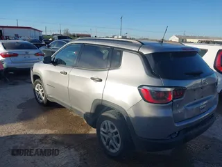 2018 Jeep Compass Sport with VIN 3C4NJCAB0JT124875, listed as a IAAI auction lot 41809953 with 136,018 mi miles. Bid and sale history available at carsss.com. Image 3.