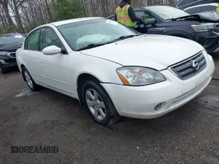 2002 Nissan Altima S with VIN 1N4AL11D72C138368, listed as a IAAI auction lot 41948552 with 242,060 mi miles. Bid and sale history available at carsss.com. Image 1.