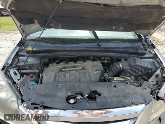 2007 Honda Odyssey EX-L with VIN 5FNRL38657B059033, listed as a Copart auction lot 54005495 with 212,674 mi miles and Salvage Title. Bid and sale history available at DreamBid. Image 12.