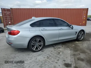 2015 BMW 4 Series 428i xDrive with VIN WBA4C9C55FD331210, listed as a Copart auction lot 54158235 with 88,372 mi miles and Salvage title. Bid and sale history available at DreamBid. Image 3.
