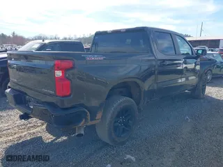 2021 Chevrolet Silverado 1500 Custom Trail Boss with VIN 1GCPYCEHXMZ305434, listed as a IAAI auction lot 41821014 with 56,356 mi miles. Bid and sale history available at carsss.com. Image 4.