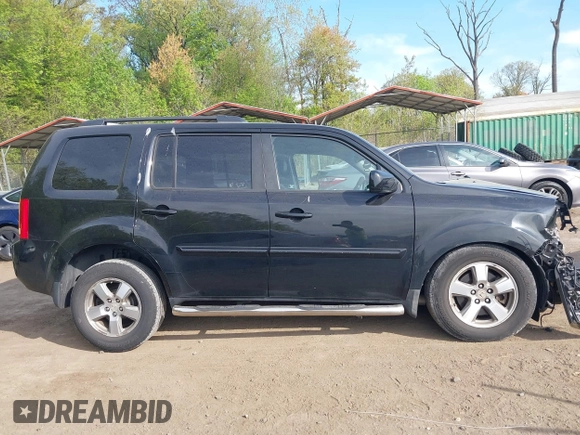 2011 Honda Pilot EX-L with VIN 5FNYF4H63BB004288, listed as a IAAI auction lot 42084984 with 215,019 mi miles and . Bid and sale history available at carsss.com. Image 14.