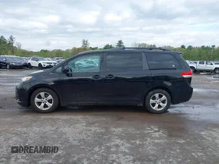 2014 Toyota Sienna LE AAS with VIN 5TDKK3DC0ES487830, listed as a IAAI auction lot 42216342 with 155,973 mi miles and . Bid and sale history available at carsss.com. Image 14.