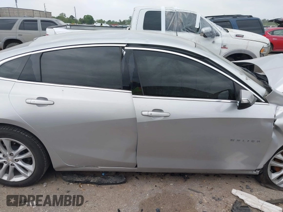 2018 Chevrolet Malibu LT z VIN 1G1ZD5ST6JF261270, wystawiony jako IAAI lot #41932928 z przebiegiem 127 971 mil mil oraz . Historia ofert i sprzedaży dostępna na DreamBid. Obrazek 13.