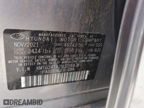 2022 Genesis G70 2.0T z VIN KMTG34TA2NU095874, wystawiony jako Copart lot #56803375 z przebiegiem 61 492 mil mil oraz Szkoda całkowita • Salvage title. Historia ofert i sprzedaży dostępna na DreamBid. Obrazek 13.