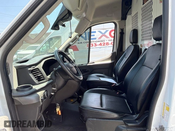 2021 Ford Transit Cargo with VIN 1FTYE1C87MKA94593, listed as a IAAI auction lot 42658954 with 99,425 mi miles and . Bid and sale history available at DreamBid. Image 14.