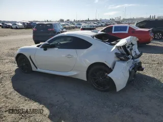 2023 Toyota GR86 Premium with VIN JF1ZNBF15P8764271, listed as a Copart auction lot 43084845 with 10,585 mi miles and Salvage Title. Bid and sale history available at carsss.com. Image 2.
