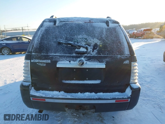 2006 Mercury Mountaineer Luxury with VIN 4M2EU47E56UJ21590, listed as a IAAI auction lot 41328194 with 216,508 mi miles. Bid and sale history available at carsss.com. Image 16.