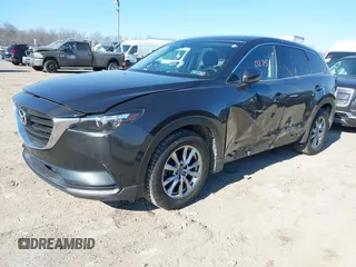 2016 Mazda CX-9 Sport with VIN JM3TCBBY8G0118088, listed as a IAAI auction lot 41710275 with 128,400 mi miles. Bid and sale history available at carsss.com. Image 2.