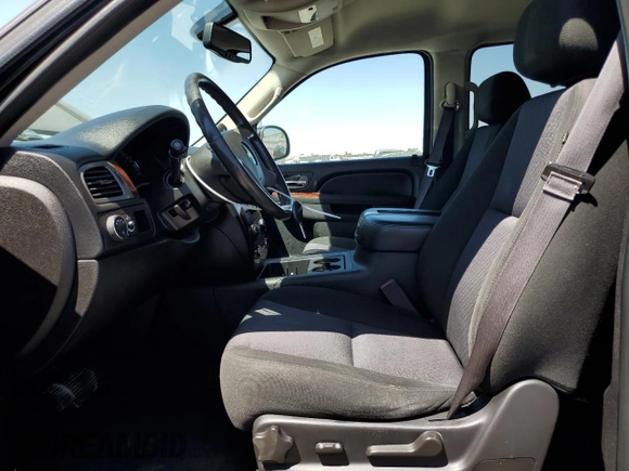 2014 Chevrolet Suburban LS with VIN 1GNSCHE03ER132039, listed as a Copart auction lot 68390234 with 129,744 mi miles and Salvage Title. Bid and sale history available at carsss.com. Image 7.