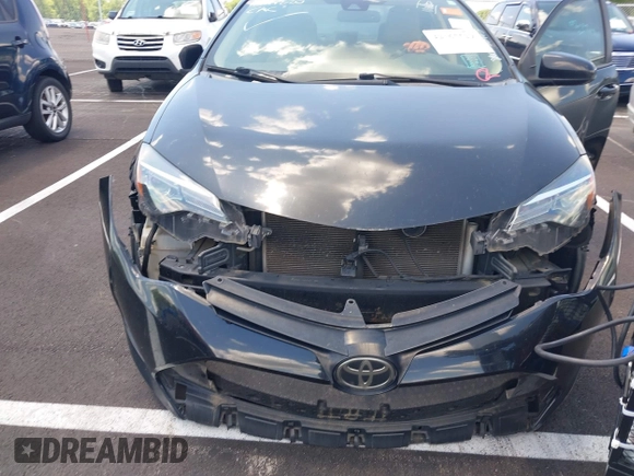 2019 Toyota Corolla L with VIN 5YFBURHE4KP860848, listed as a IAAI auction lot 42167529 with 152,301 mi miles. Bid and sale history available at carsss.com. Image 6.