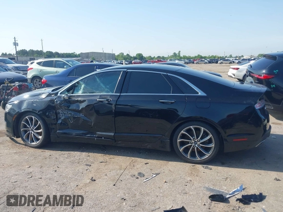 2018 Lincoln MKZ Select z VIN 3LN6L5C90JR625598, wystawiony jako IAAI lot #42189498 z przebiegiem 98 803 mil mil oraz . Historia ofert i sprzedaży dostępna na DreamBid. Obrazek 13.