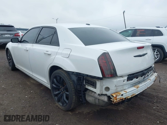 2014 Chrysler 300 S with VIN 2C3CCABG9EH355602, listed as a IAAI auction lot 42244756 with 165,816 mi miles and . Bid and sale history available at DreamBid. Image 3.