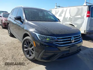 2023 Volkswagen Tiguan SE with VIN 3VV3B7AX3PM085470, listed as a IAAI auction lot 41731153 with 14,911 mi miles and . Bid and sale history available at DreamBid. Image 1.