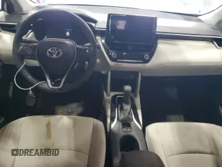 2023 Toyota Corolla Cross LE z VIN 7MUBAAAG4PV042580, wystawiony jako Copart lot #60788025 z przebiegiem 59 576 mil mil oraz Szkoda całkowita • Salvage title. Historia ofert i sprzedaży dostępna na DreamBid. Obrazek 8.