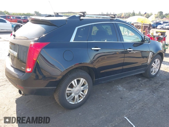 2016 Cadillac SRX Luxury Collection with VIN 3GYFNEE39GS532145, listed as a IAAI auction lot 42670496 with 193,959 mi miles and . Bid and sale history available at DreamBid. Image 4.