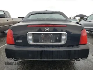 2005 Cadillac DeVille Limousine z VIN 1GEEH90Y05U550363, wystawiony jako Copart lot #55697945 z przebiegiem 47 196 mil mil oraz Czysty tytuł • Clean title. Historia ofert i sprzedaży dostępna na DreamBid. Obrazek 6.